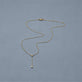Stone and Strand 14K Yellow Gold Perfect Pear Diamond Lariat Necklace Editorial Image