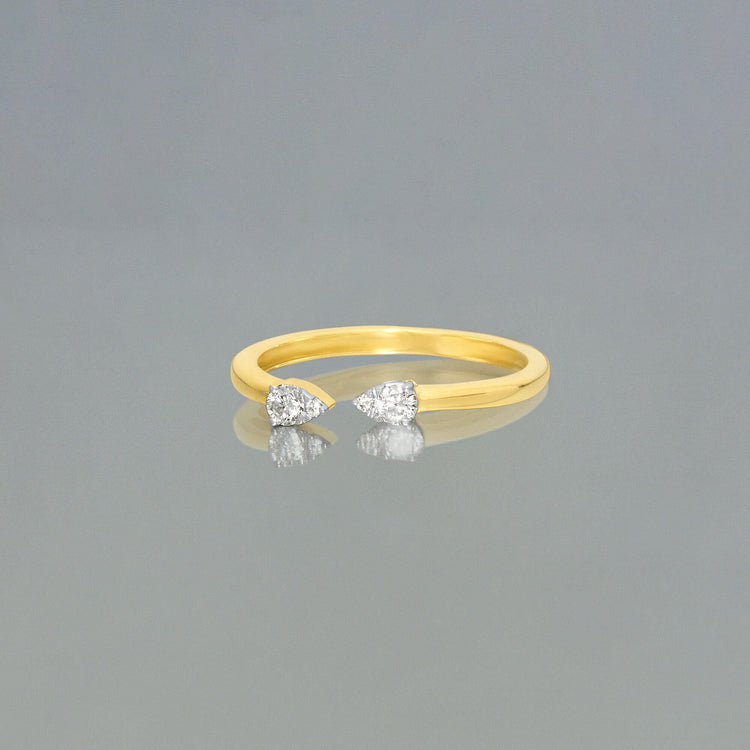 Stone and Strand 10K Yellow Gold Perfect Pear Pinch Ring Editorial Image