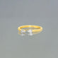 Stone and Strand 10K Yellow Gold Perfect Pear Pinch Ring Editorial Image
