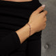 Image of 10K Yellow Gold Pink Power Bubble Bracelet with Ruby and Pink Sapphire on Models Arm