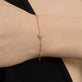 Image of 10K Yellow Gold Pink Sapphire Flower Bracelet on Models Arm