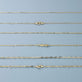 Still life image of Pivot by Stone and Strand Paperclip Chain with Stone and Strand solid gold jewelry
