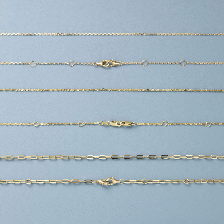 Still life image of Pivot by Stone and Strand Smashed Rolo Chain with Stone and Strand solid gold jewelry