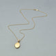 Stone and Strand 14K Yellow Gold Precious Momenets Necklace Editorial Image