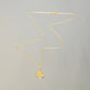 Stone and Strand 14K Yellow Gold Puff Puff Pave Heart Necklace Editorial Image
