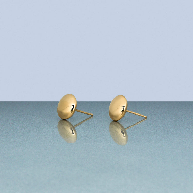 Stone and Strand 10K Yellow Gold Medium Puffed Dome Studs Editorial Image