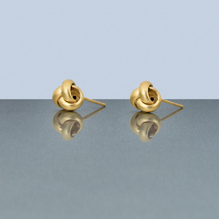 Stone and Strand 14K Yellow Gold Puffed Knot Studs Editorial Image