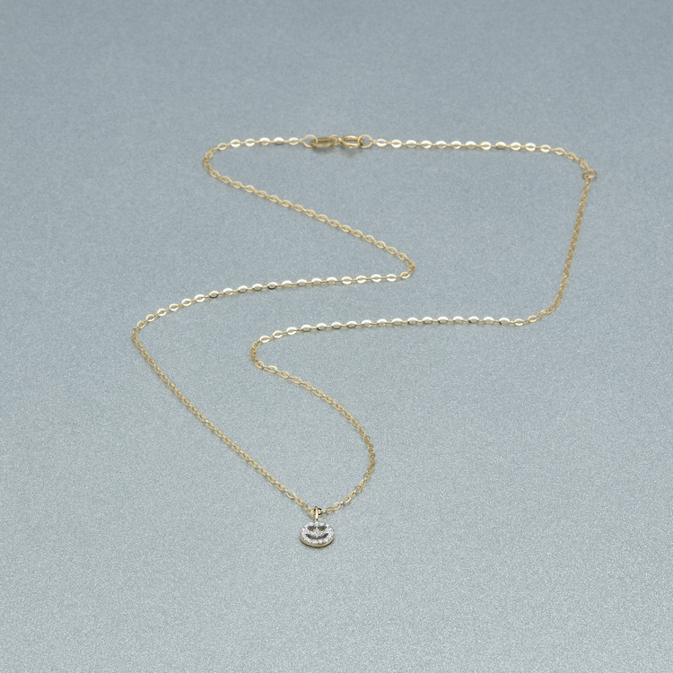 Stone and Strand 10K Yellow Gold Pave Smiley Heart Eye Necklace Editorial Image