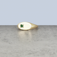 Stone and Strand 10K Yellow Gold Personalized Birthstone Signet Ring with Emerald Editorial Image