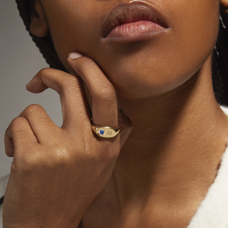 Image of 10K Yellow Gold Engraved Personalized Birthstone Signet Ring with Blue Sapphire on Models Hand