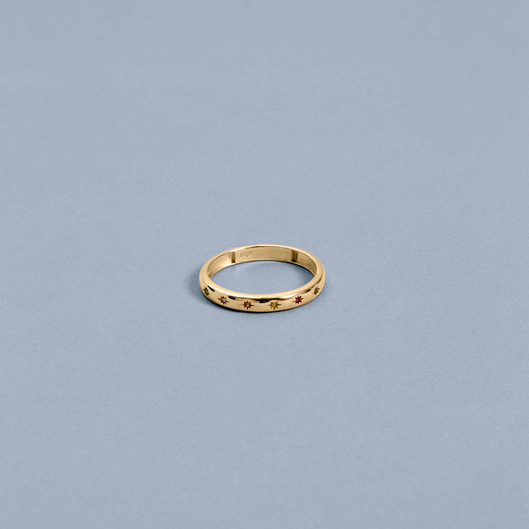 Stone and Strand 10K Yellow Gold Rainbow Starburst Gemstone Band Editorial Image