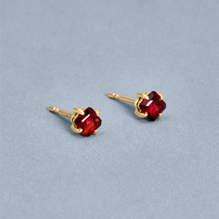 Stone and Strand 10K Yellow Gold Red Studio Garnet Studs Editorial Image