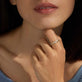Image of 10K Yellow Gold Dainty Diamond Pirouette Band on Models Hand