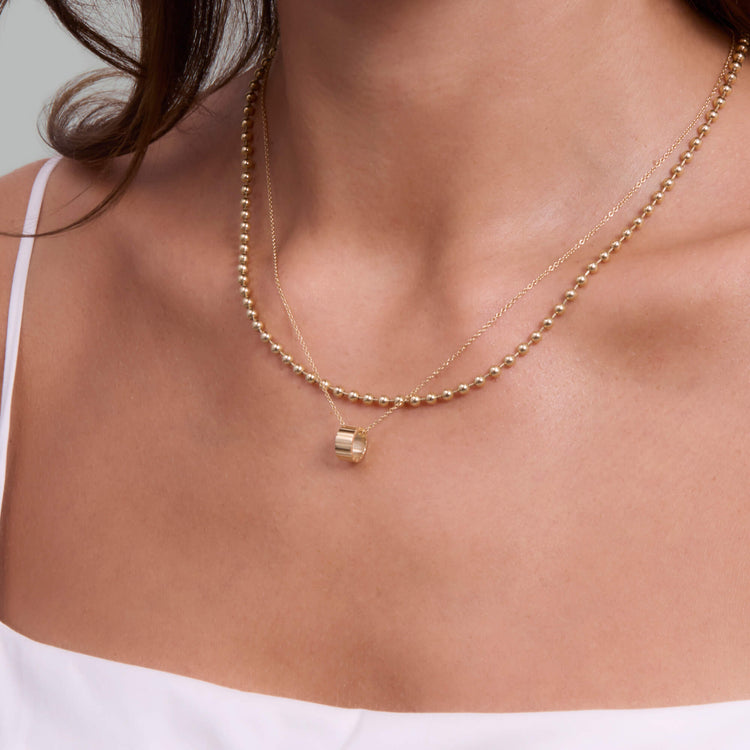 Image of 14K Yellow Gold Ridged Rondelle Charm with Stone and Strand Necklaces