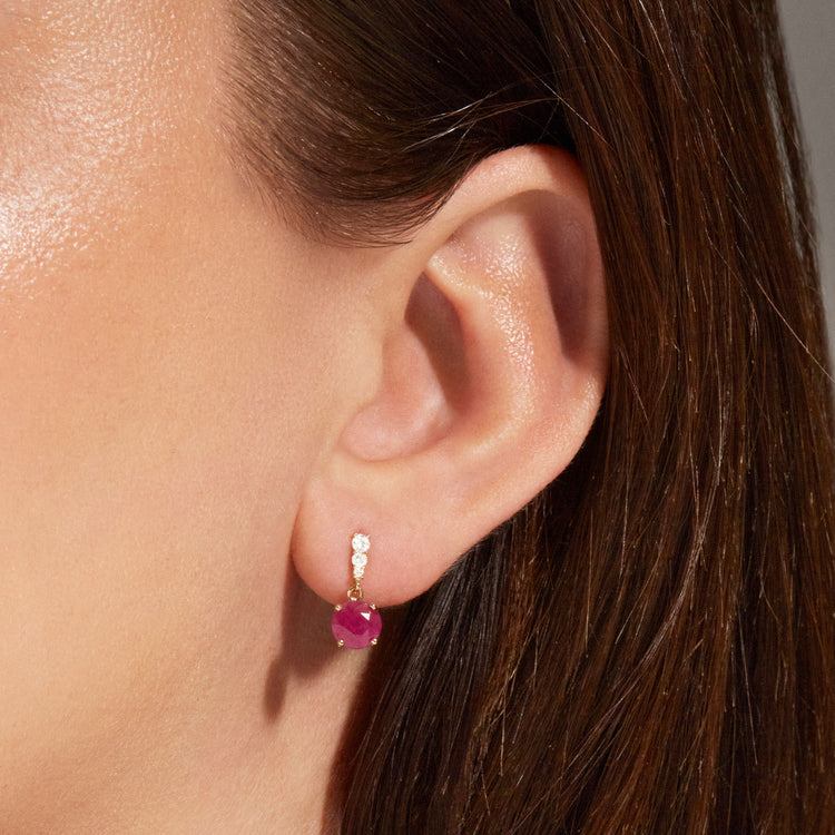 Image of 14K Yellow Gold Ruby and Diamond Earrings on Models Ear