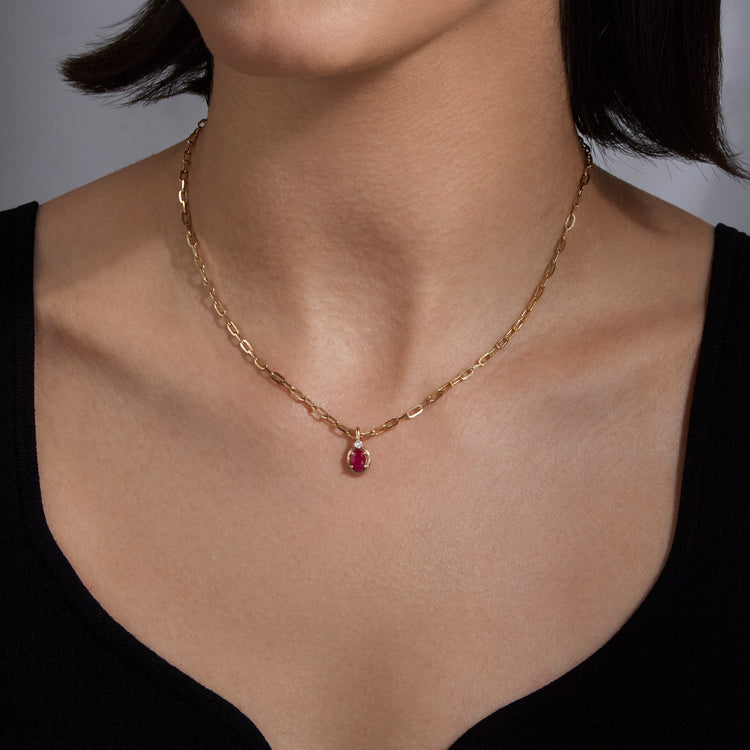 Image of 10K Yellow Gold Ruby Bonbon Diamond Charm on Models Neck
