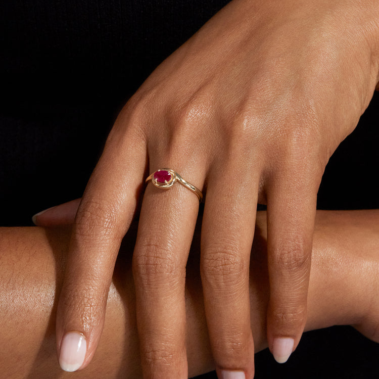 Image of 10K Yellow Gold Ruby Bonbon Merge Ring on Models Hand
