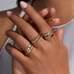 Image of 10K Yellow Gold Ruby Bonbon Merge Ring with Stone and Strand Rings