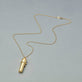Stone and Strand 14K Yellow Gold Scroll Necklace Editorial Image