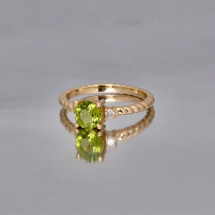 Stone and Strand 10K Yellow Gold Seagrass At Twilight Diamond and Peridot Ring Editorial Image