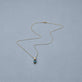 Stone and Strand 14K Yellow Gold Serenity Topaz Mood Charm Editorial Image