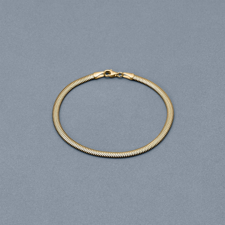 Stone and Strand 14K Yellow Gold Serpentine Bracelet Editorial Image