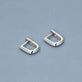 Stone and Strand Sterling Silver Knife Edge Single Hoop Editorial Image