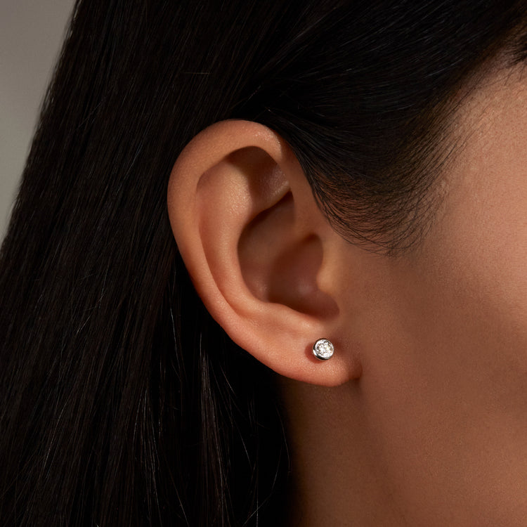 Image of Sterling Silver Lab-Created Diamond Bubble Studs on Models Ear