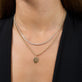 Image of 14K Yellow Gold Small Gold Initial Crest Charm with Stone and Strand Necklaces