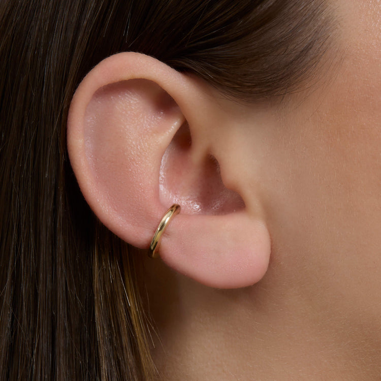 Image of 14K Yellow Gold Small Puff Ear Cuff on Models Ear