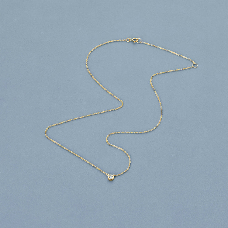 Stone and Strand 10K Yellow Gold Small Round Diamond Necklace Editorial Image