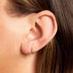 Image of 10K Yellow Gold Small Second Hole Huggies on Models Ear