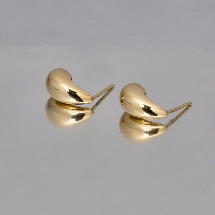 Stone and Strand 14K Yellow Gold Small Teardrop Earrings Editorial Image