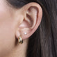 Model wearing Small Teardrop Earrings with solid gold Stone and Strand jewelry