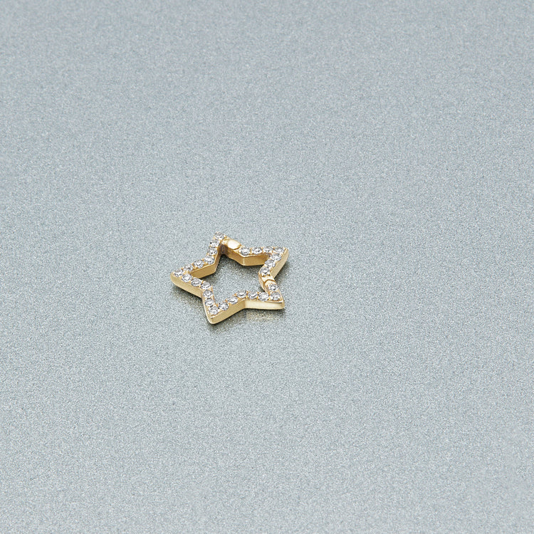 Stone and Strand 10K Yellow Gold Star Pop Lock Editorial Image