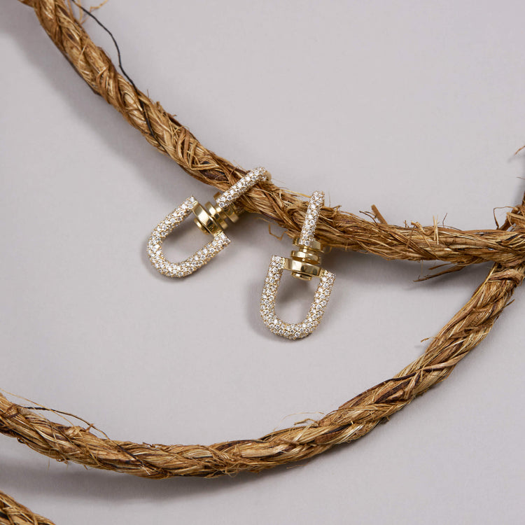 Still life image of Starboard Diamond Earrings with Stone and Strand solid gold jewelry