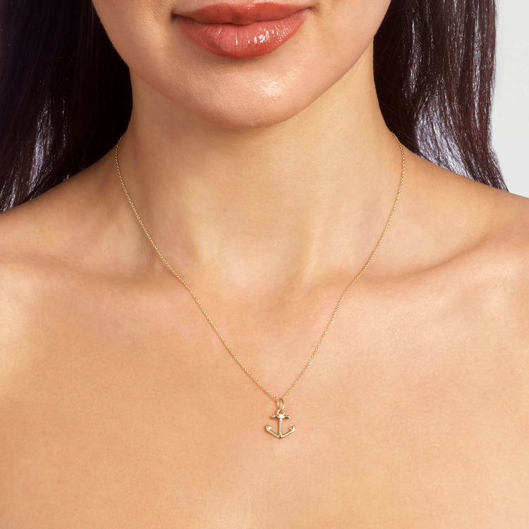 Image of 10K Yellow Gold Stay Grounded Anchor Necklace on Models Neck