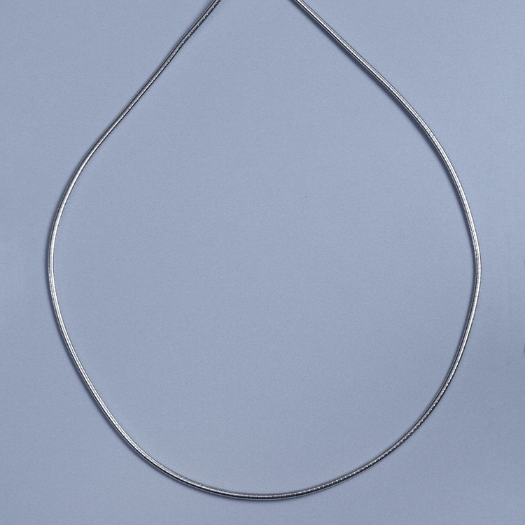 Stone and Strand Sterling Silver Omega Collar Necklace Editorial Image