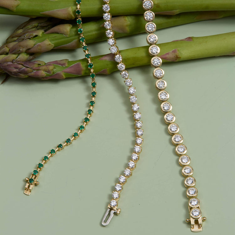 Still life image of 4-5 CTW Lab-Created Tennis Bracelet with Stone and Strand solid gold jewelry