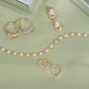 Still life image of Gold Heart huggie Single Earring with Stone and Strand solid gold jewelry