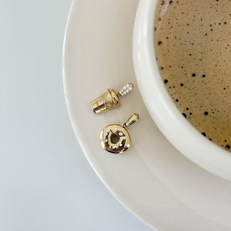 Still life image of Coffee Meets Bagel Charm Set with Stone and Strand solid gold jewelry
