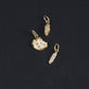 Still life image of Diamond Cookie Charm with Stone and Strand solid gold jewelry