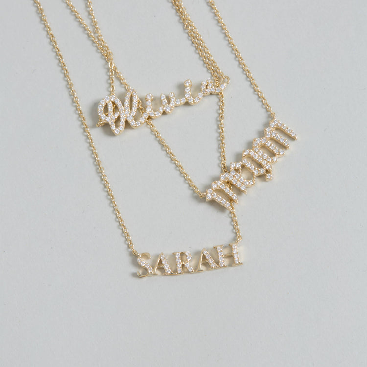 Still life image of Diamond Gothic Name Necklace with Stone and Strand solid gold jewelry