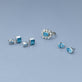 Still life image of Full Volume Le Bleu Oval Stud Earrings with Stone and Strand solid gold jewelry
