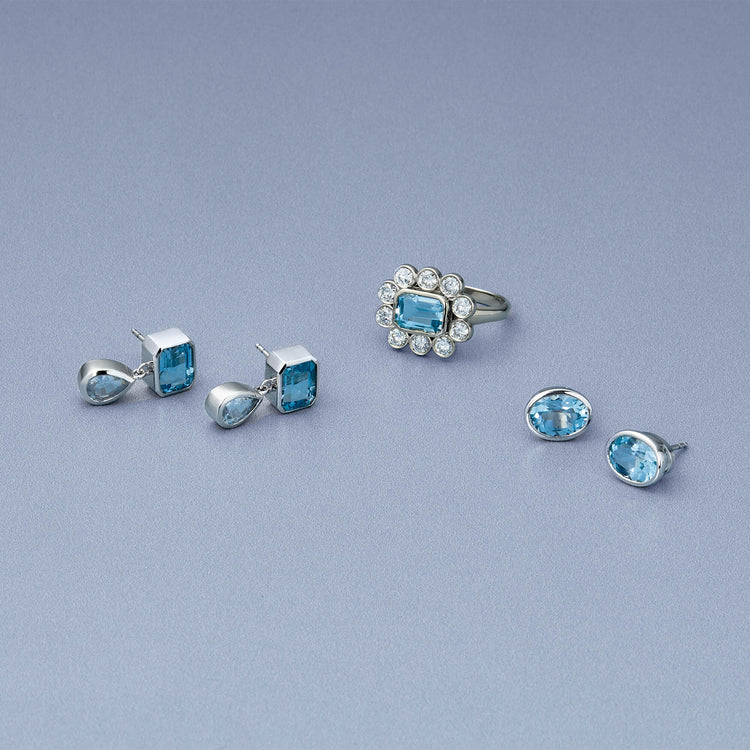 Still life image of Full Volume Le Bleu Vintage Flower Ring with Stone and Strand solid gold jewelry