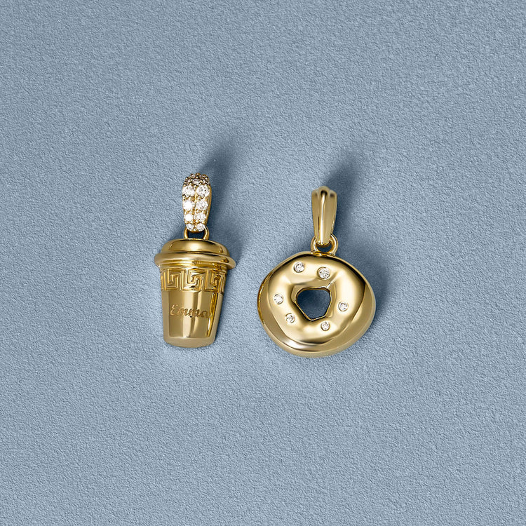 Still life image of Gold Bagel Brunch Charm with Stone and Strand solid gold jewelry