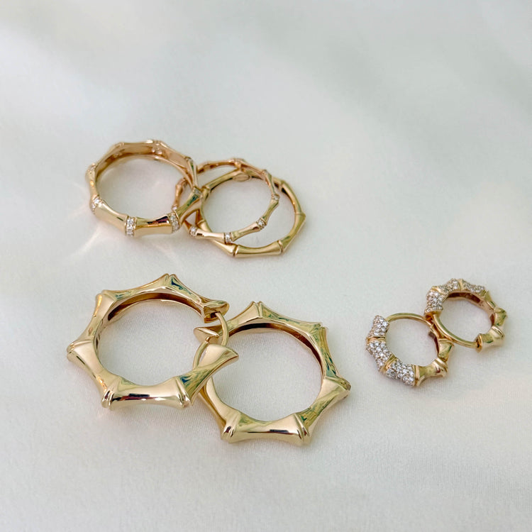 Still life image of Gold Bamboo Huggies with Stone and Strand solid gold jewelry