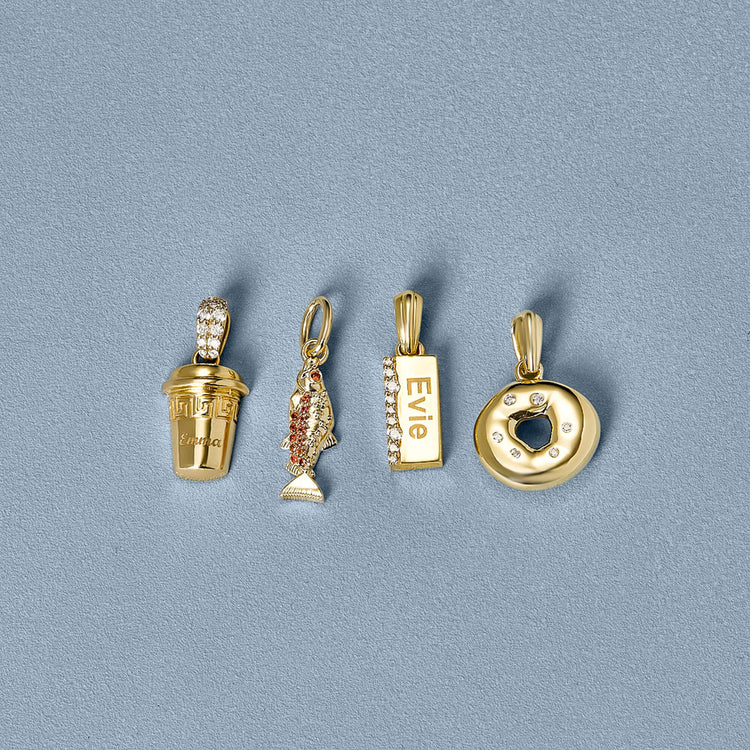 Still life image of Gold Coffee Brunch Charm with Stone and Strand solid gold jewelry