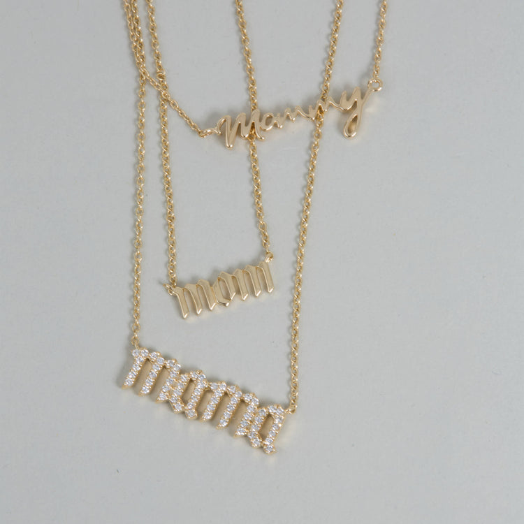 Still life image of Gold Best Mommy Bracelet with Stone and Strand solid gold jewelry