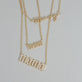 Still life image of Gold Best Mommy Bracelet with Stone and Strand solid gold jewelry